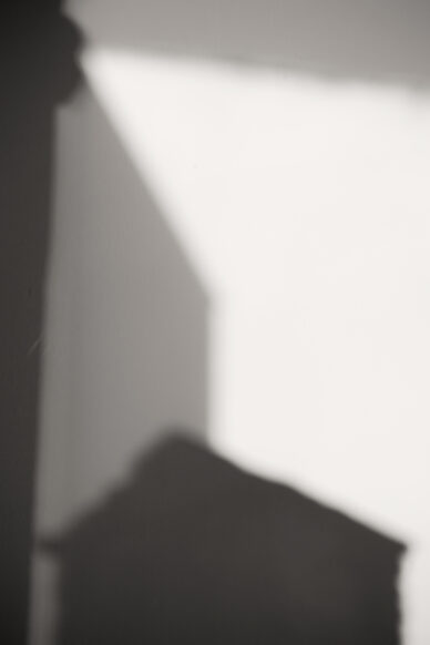 Sombras y casas en reflejo crsital